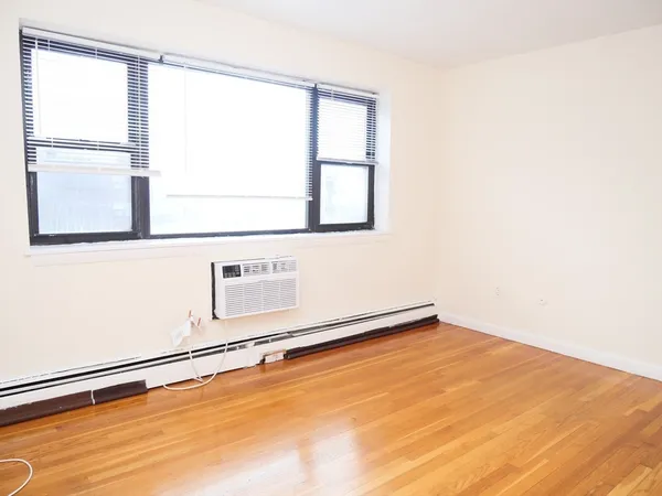 a view of a room with a large window