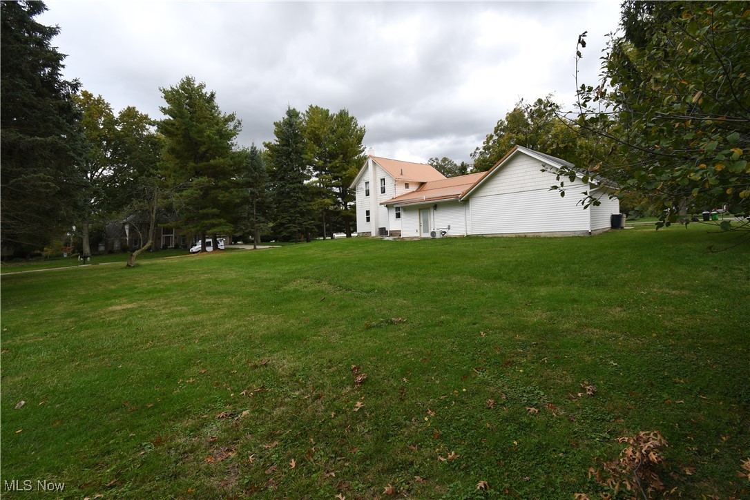355 Jaycox Road Avon Lake, OH 44012 - Photo 4 of 29 View of back of house and backyard
