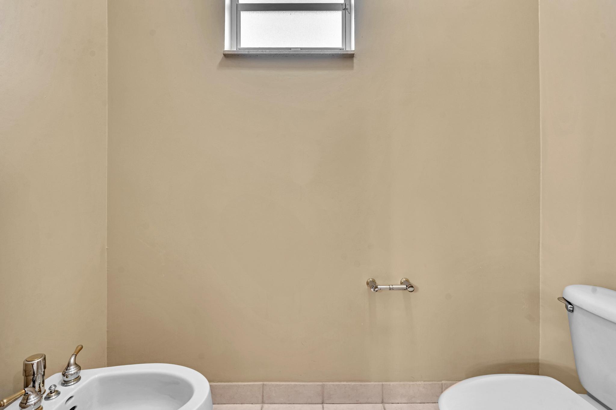 11604 Kensington Court Boca Raton, FL 33428 - Photo 37 of 81 a white toilet sitting next to a white wall