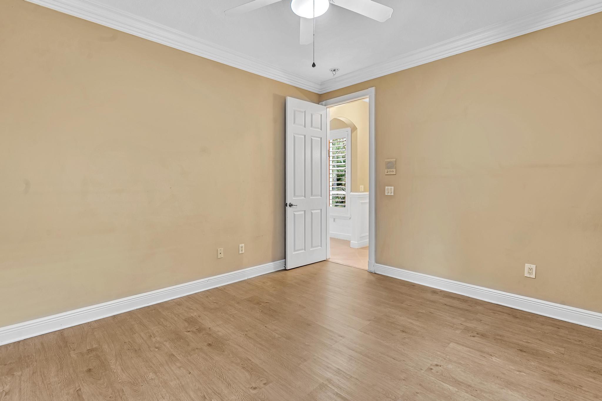 11604 Kensington Court Boca Raton, FL 33428 - Photo 59 of 81 a view of an empty room with a window