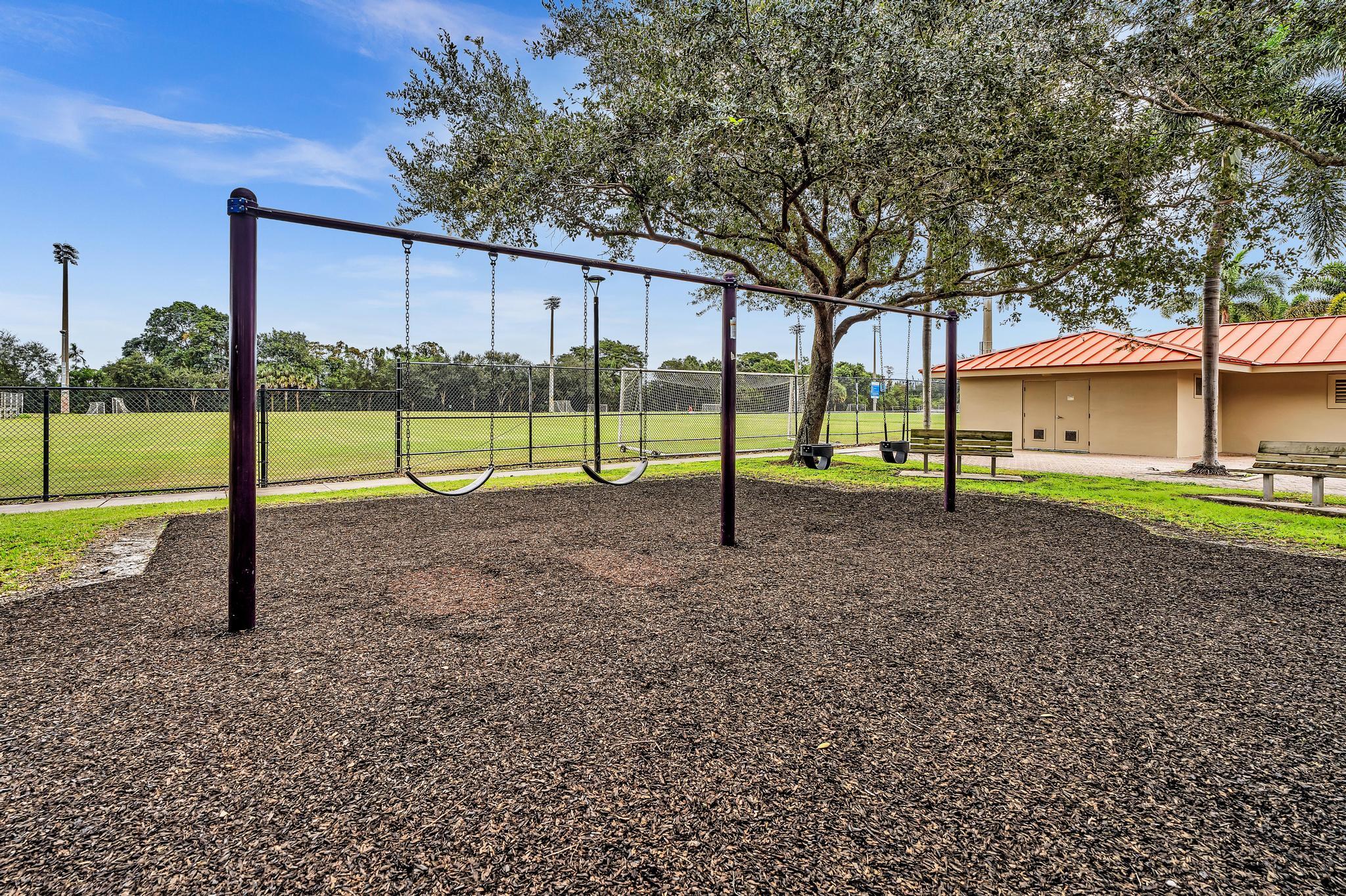 11604 Kensington Court Boca Raton, FL 33428 - Photo 76 of 81 a view of park with kids yard