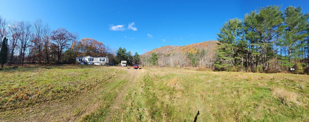 2155 Route 2 Charlemont, MA 01370 - Photo 26 of 26 a view of dirt yard with a large tree