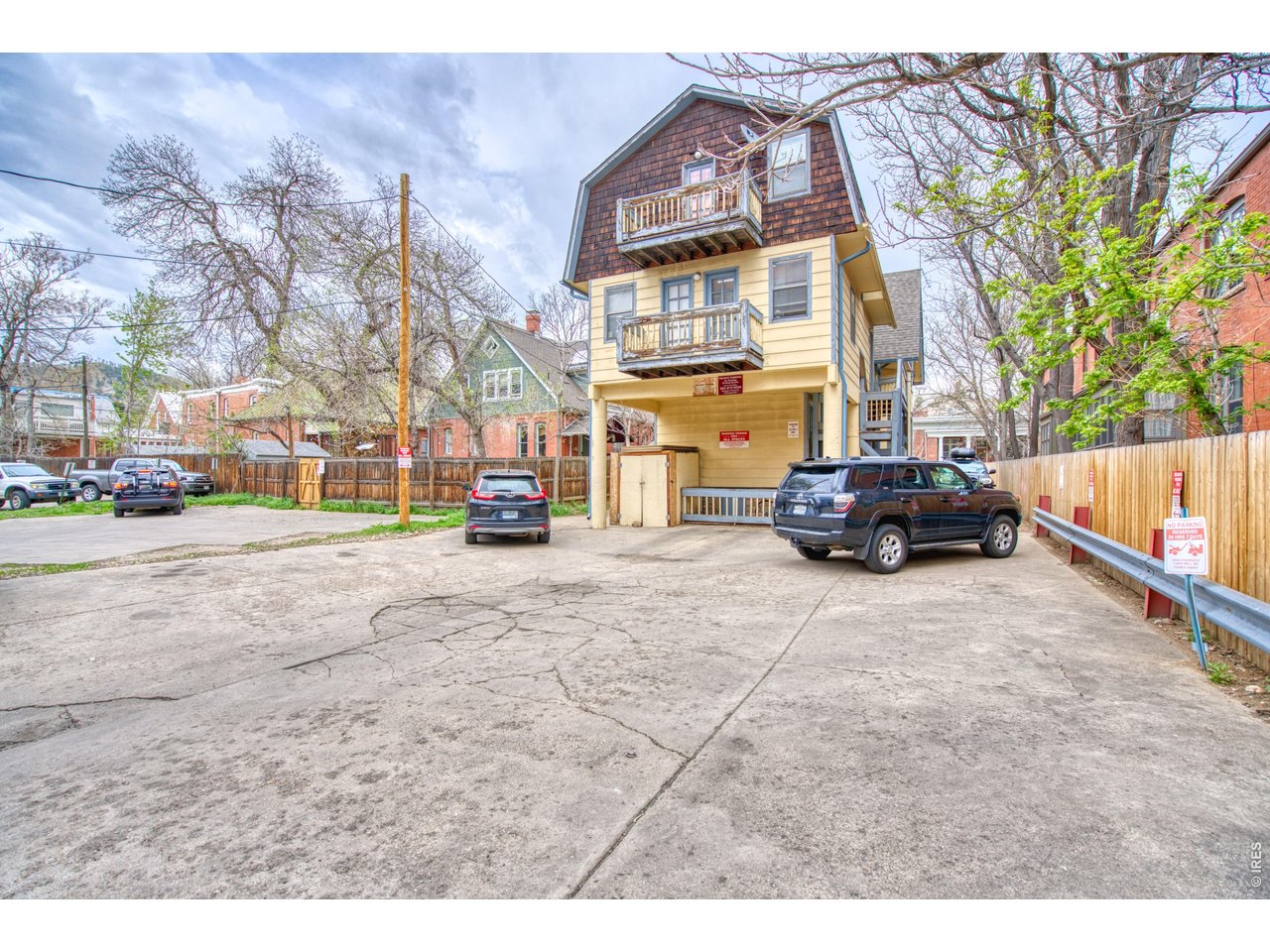 1034 Spruce Street Boulder, CO 80302 - Photo 11 of 17 a parked cars parked on the side of a street