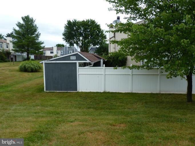 17420 Hughes Road Poolesville, MD 20837 - Photo 4 of 21 a view of a tiny house with a yard