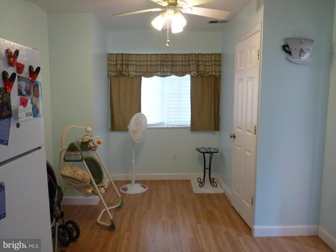 17420 Hughes Road Poolesville, MD 20837 - Photo 10 of 21 a room with gym equipment and a window