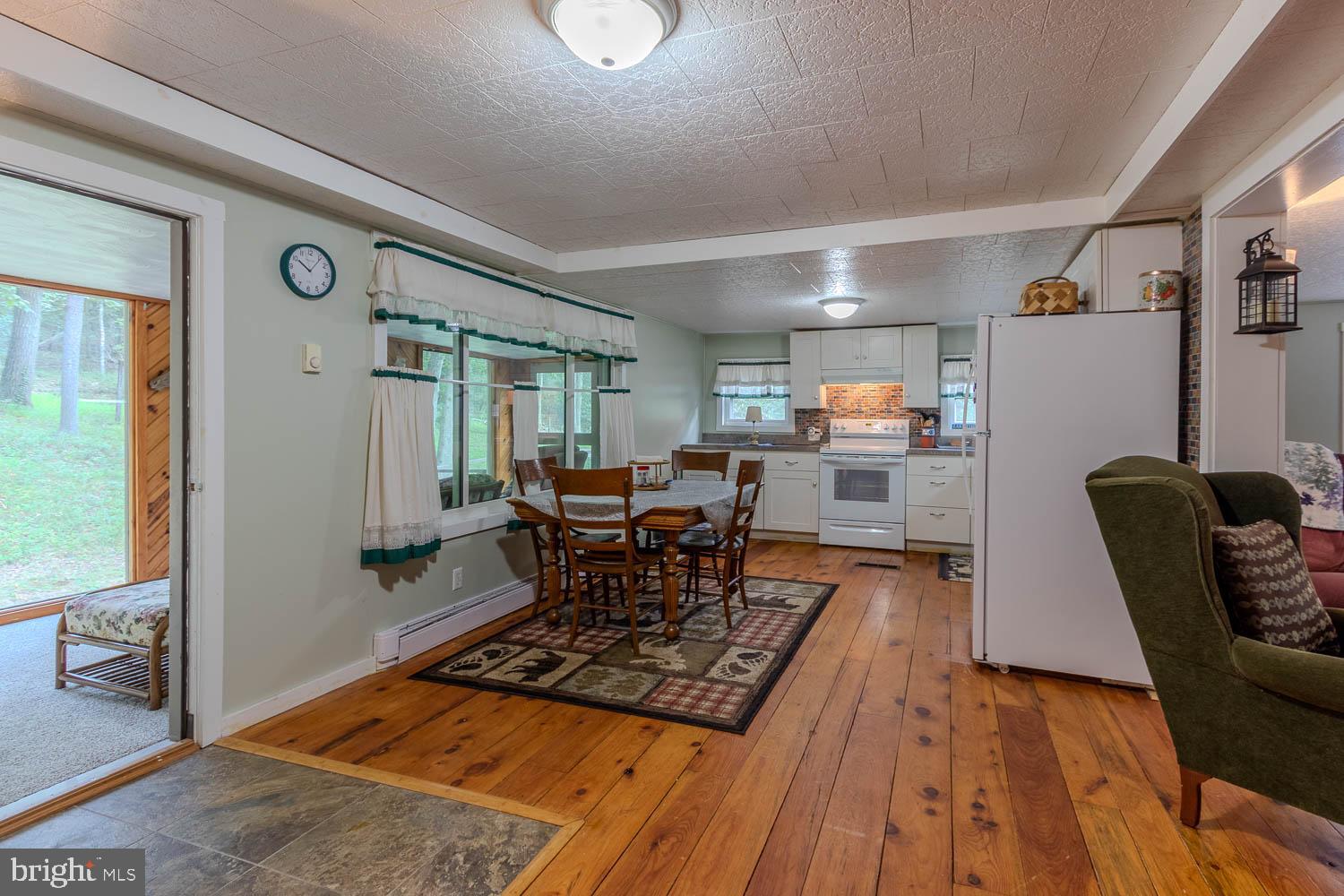 14742 Happy Hills Road Huntingdon, PA 16652 - Photo 6 of 48 a living room with furniture rug and window