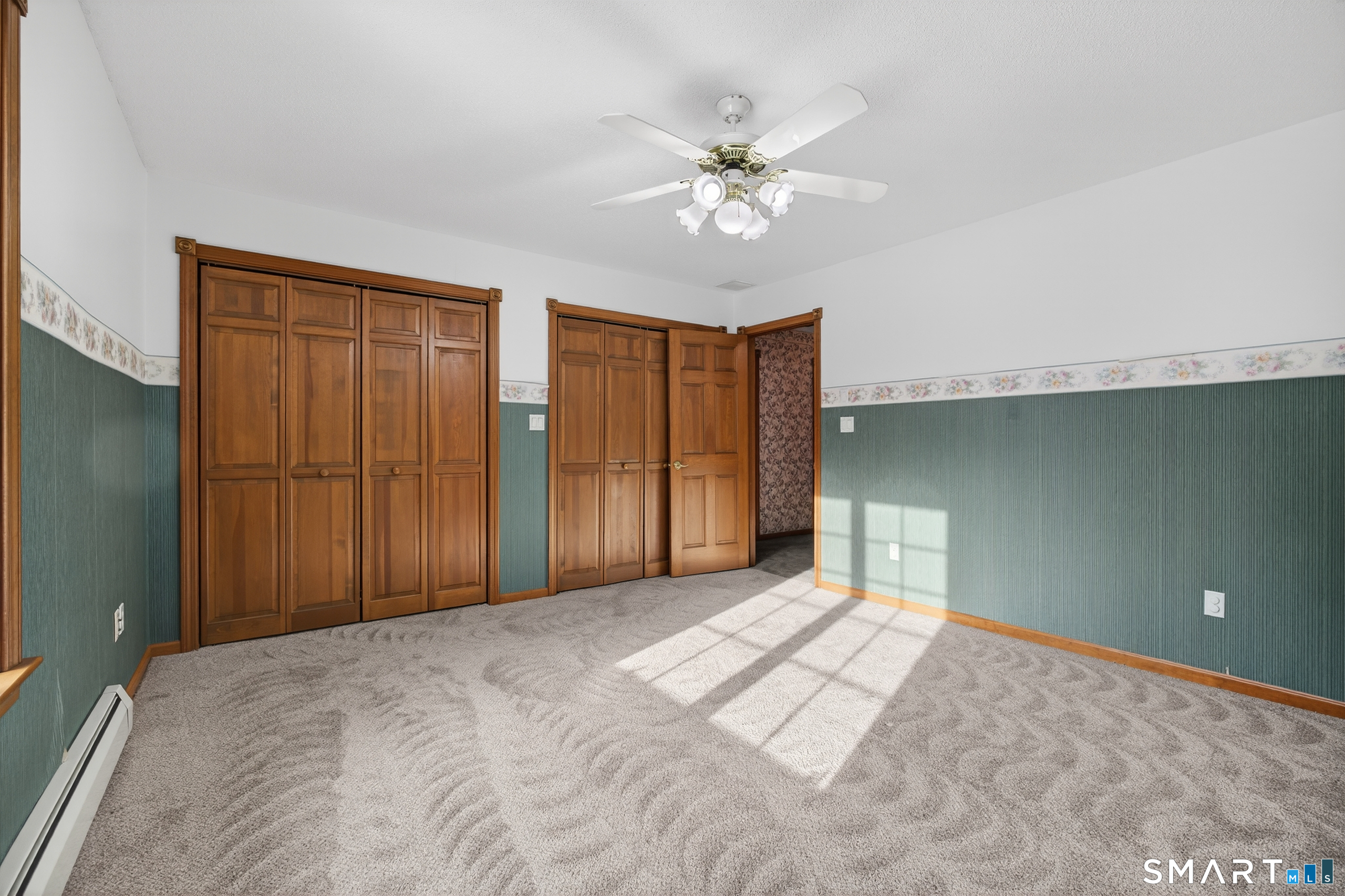 61 Edwards Road Bethany, CT 06524 - Photo 12 of 40 a view of a livingroom with a chandelier