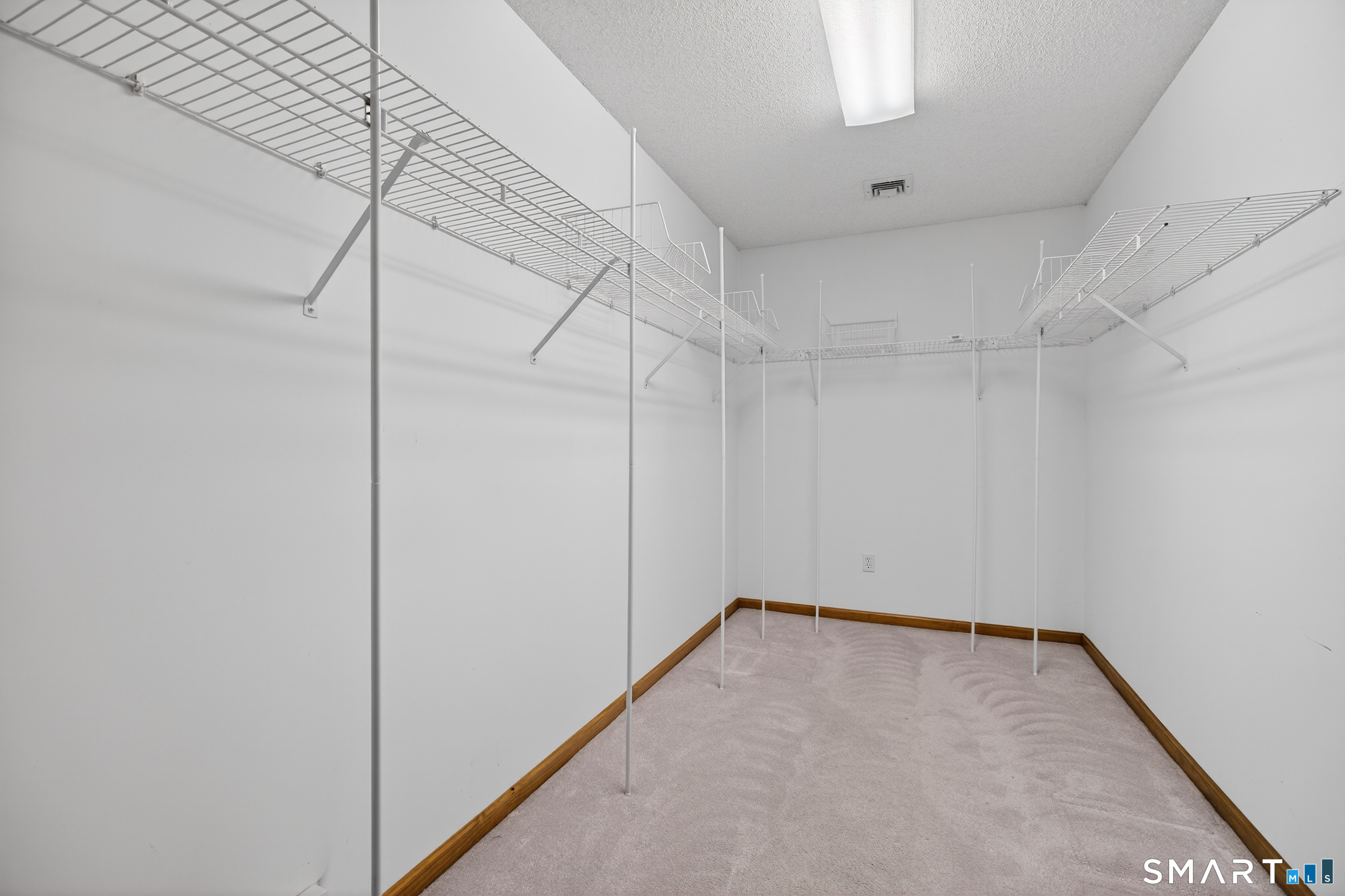 61 Edwards Road Bethany, CT 06524 - Photo 14 of 40 a view of a room with racks on the wall