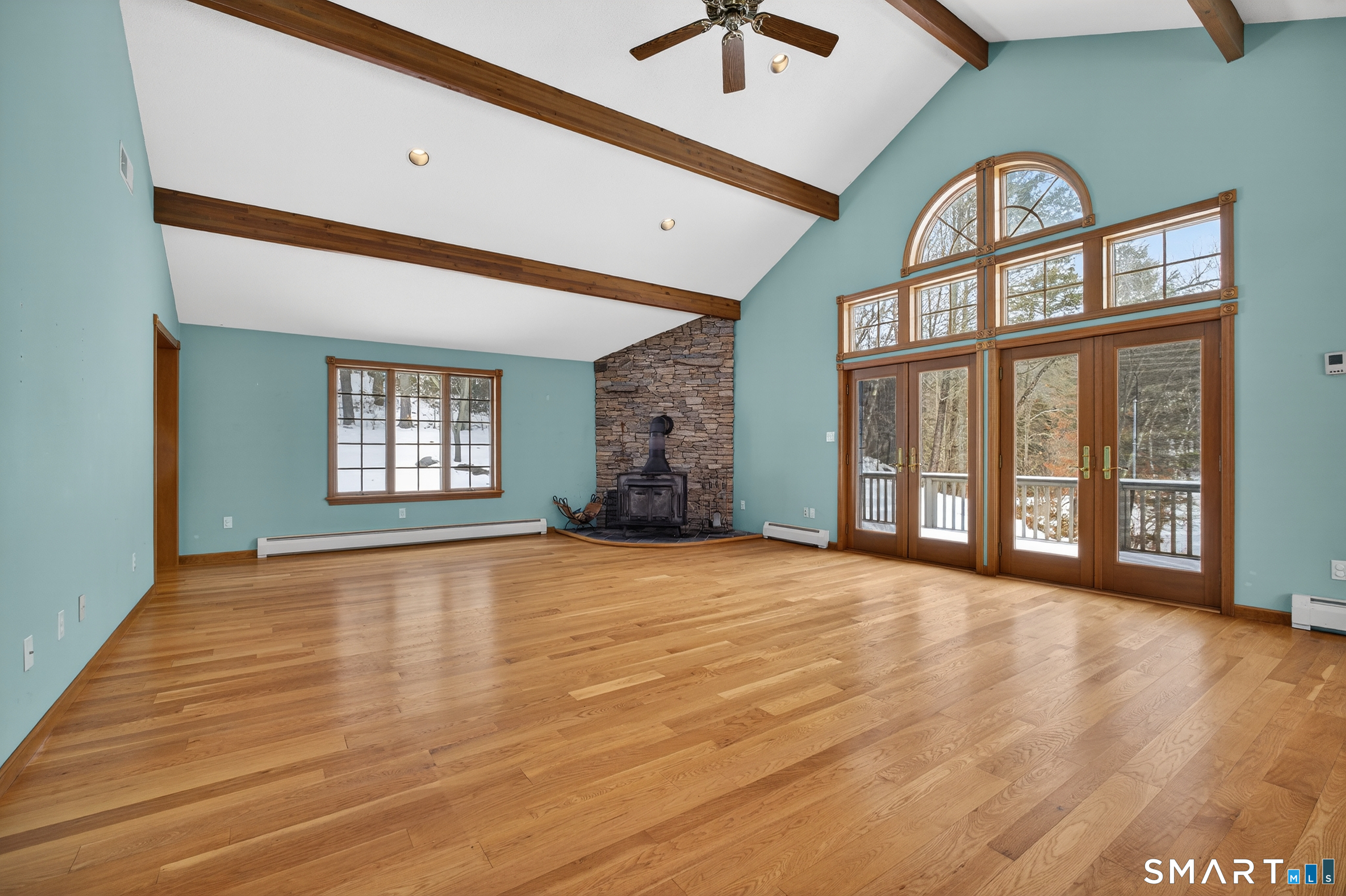 61 Edwards Road Bethany, CT 06524 - Photo 26 of 40 a view of an empty room with a window and a fireplace
