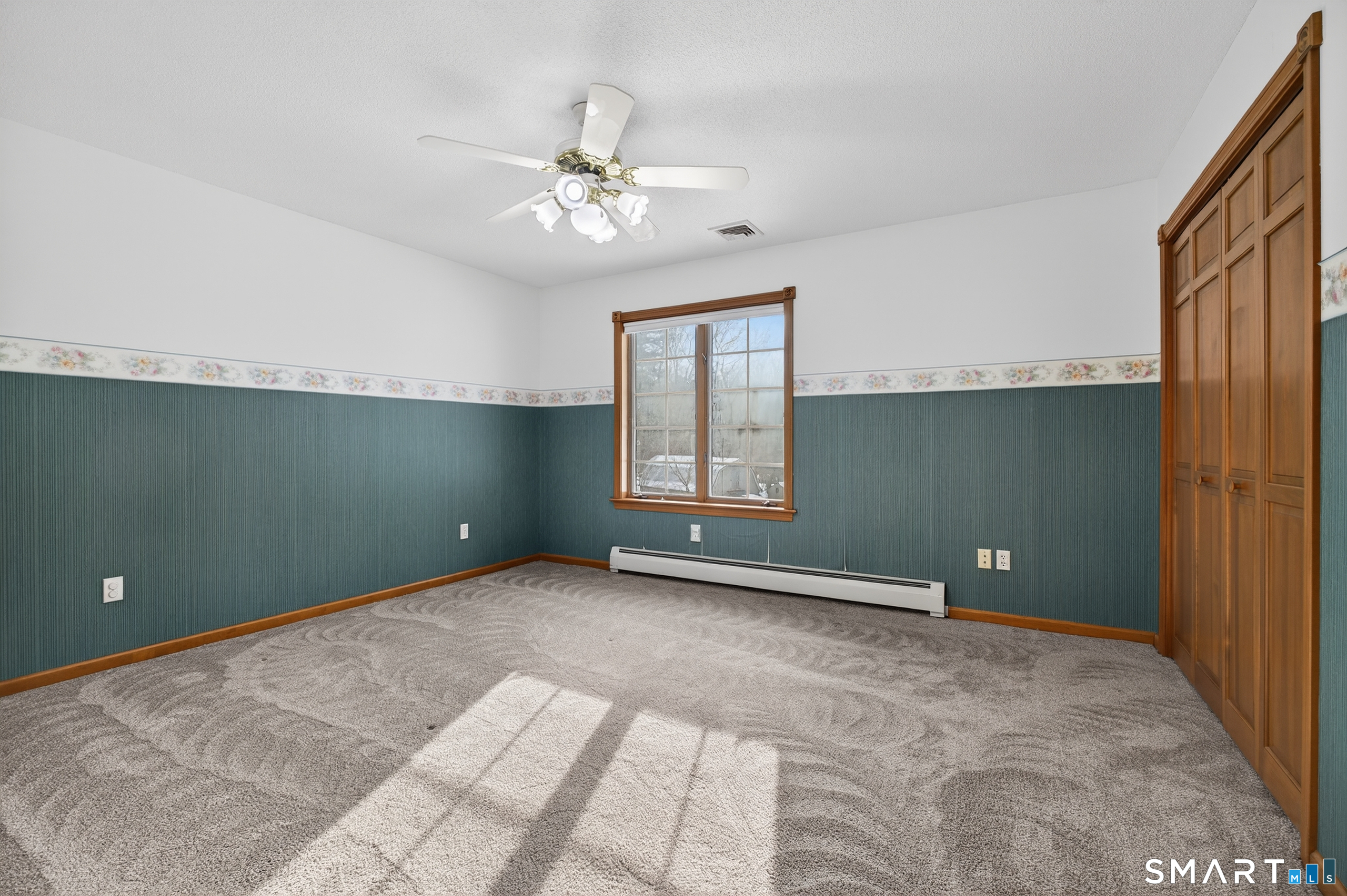 61 Edwards Road Bethany, CT 06524 - Photo 33 of 40 a view of an empty room with a window