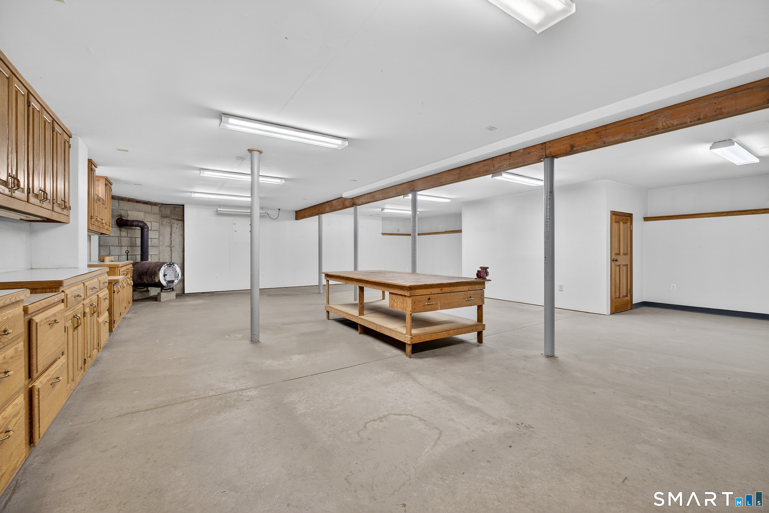 61 Edwards Road Bethany, CT 06524 - Photo 36 of 40 a living room with furniture pool table and a wooden floor