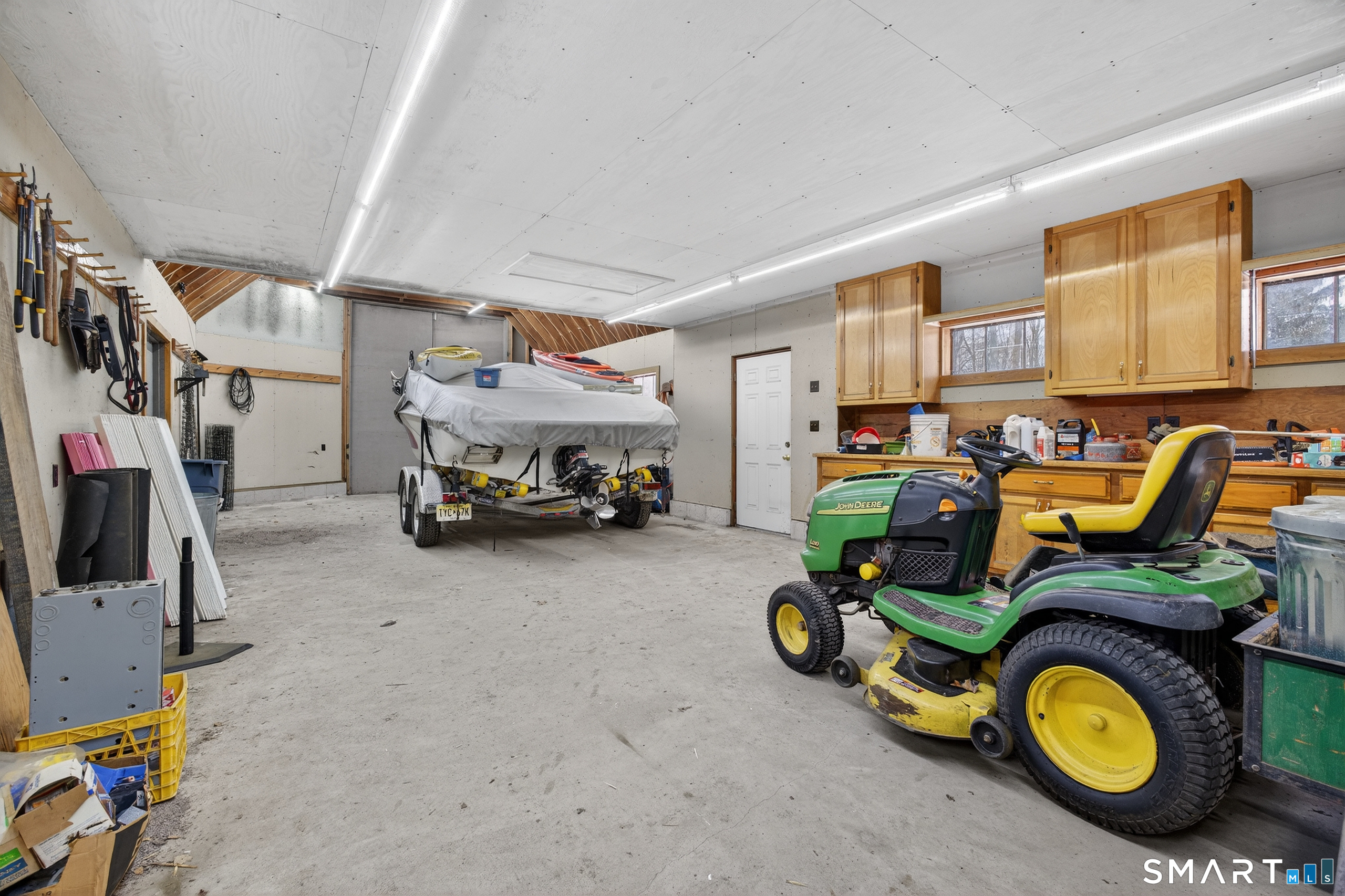 61 Edwards Road Bethany, CT 06524 - Photo 40 of 40 a car is parked in a garage