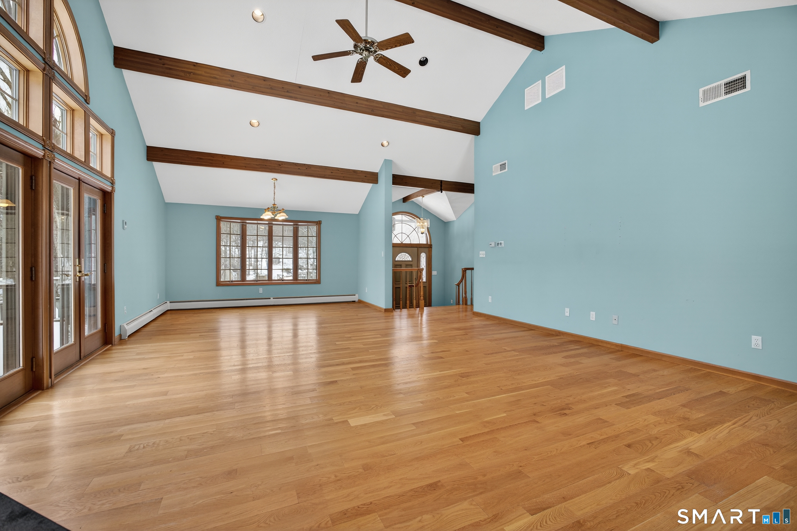 61 Edwards Road Bethany, CT 06524 - Photo 6 of 40 a view of an empty room with a window and fireplace