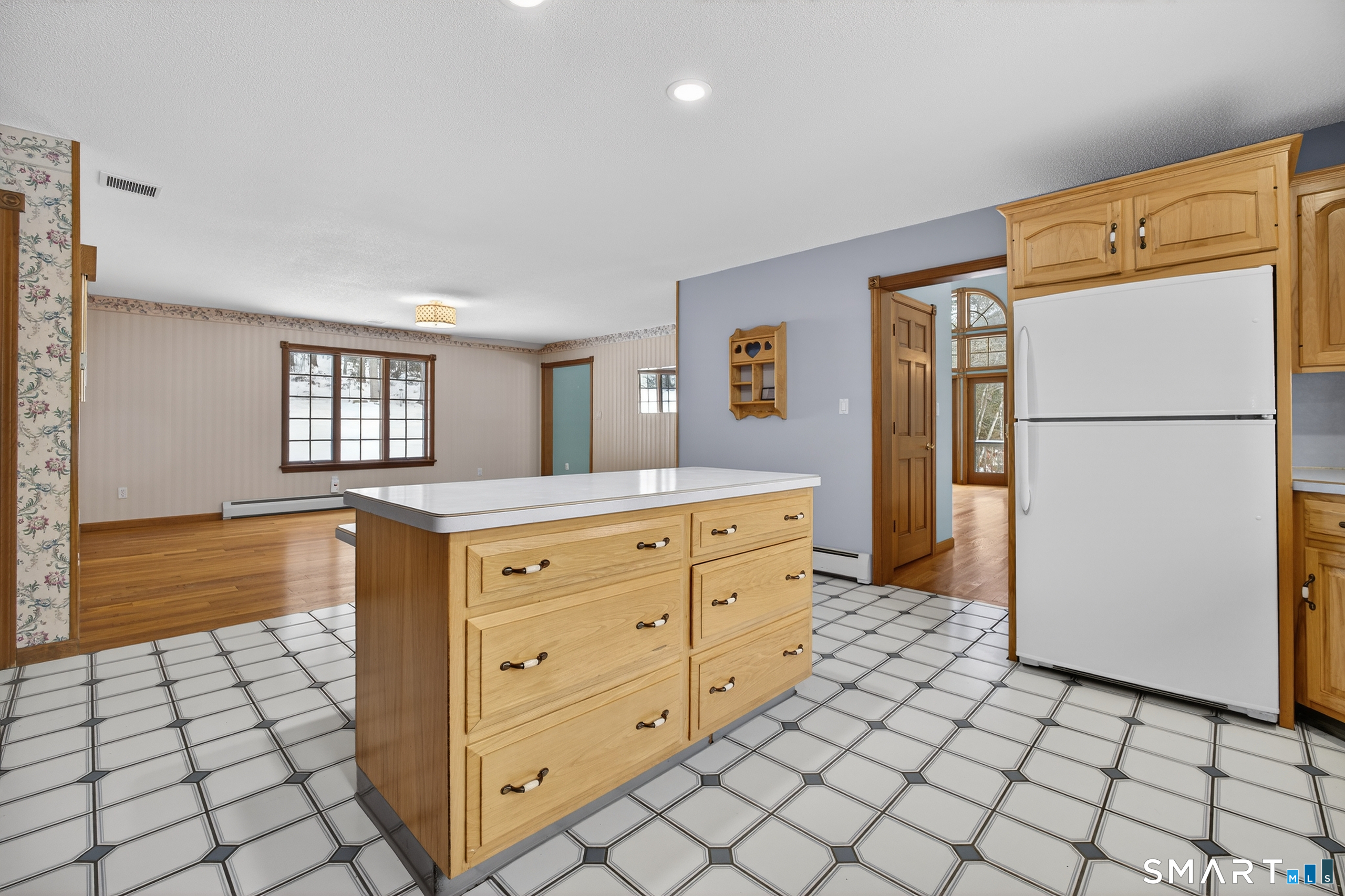 61 Edwards Road Bethany, CT 06524 - Photo 10 of 40 a kitchen with cabinets and white appliances