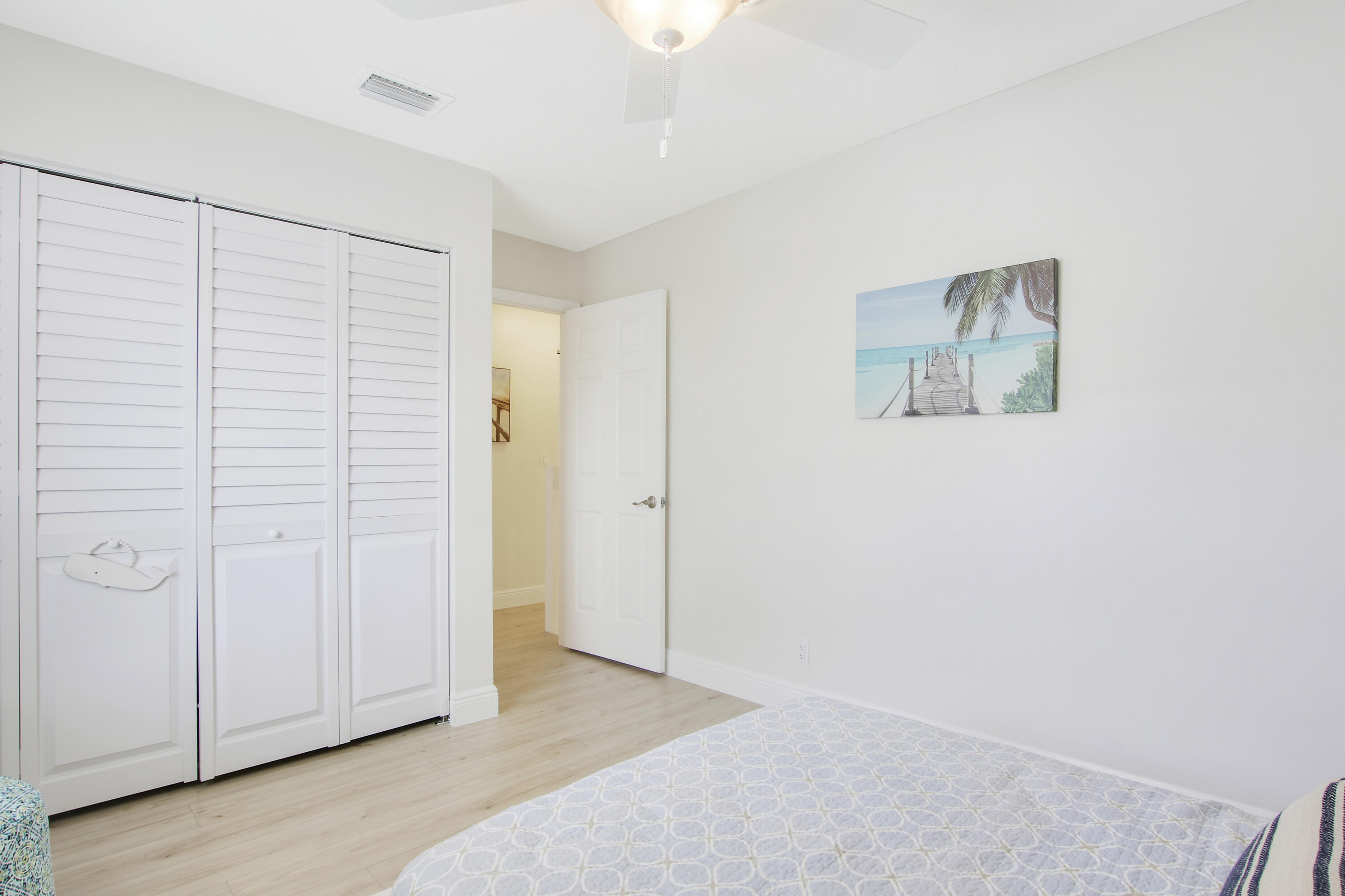 1219 Ocean Dunes Circle Jupiter, FL 33477 - Photo 16 of 32 Guest Bedroom 2 with Large closet space