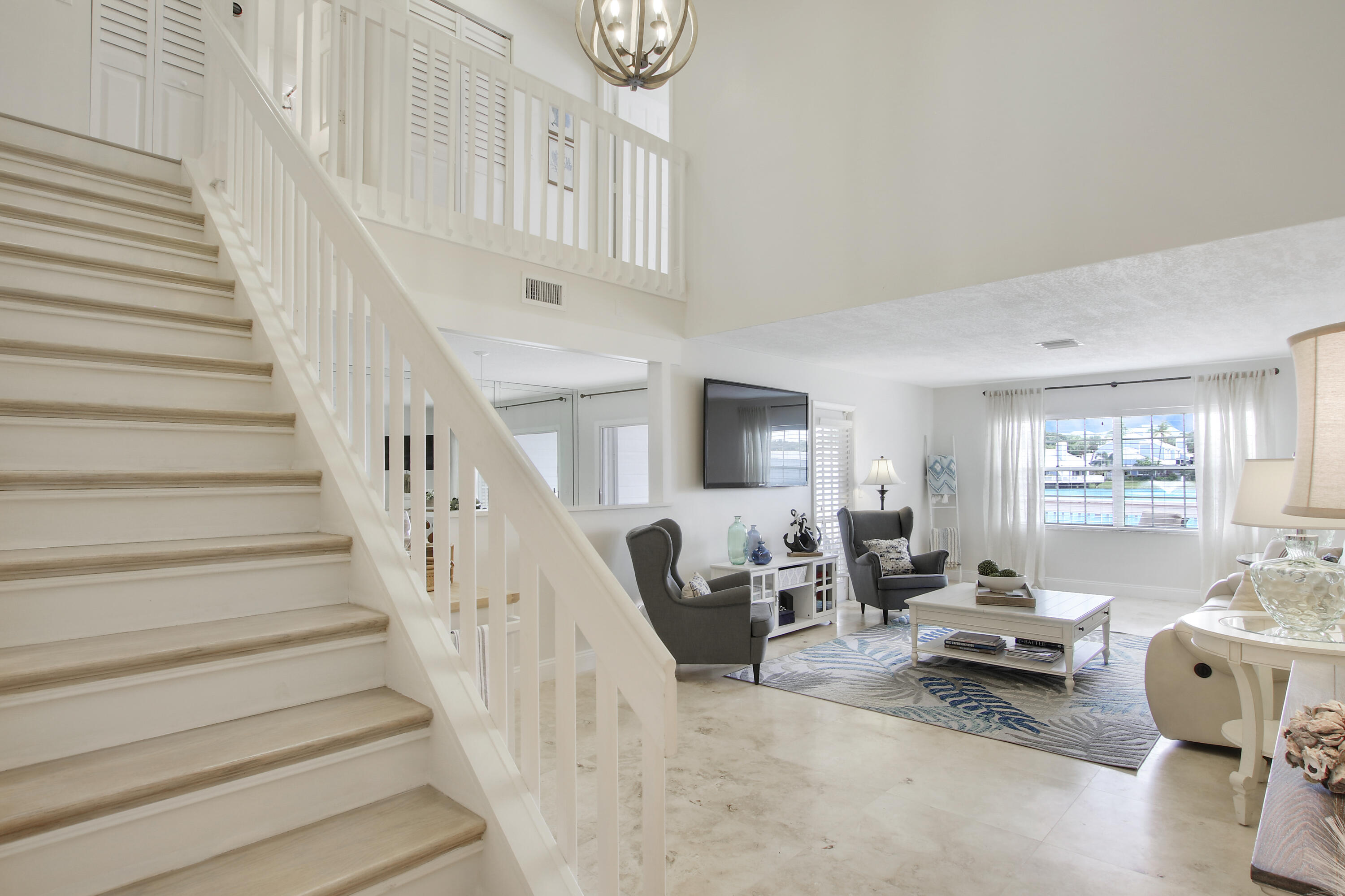 1219 Ocean Dunes Circle Jupiter, FL 33477 - Photo 3 of 32 Two Stories Wood Stairs