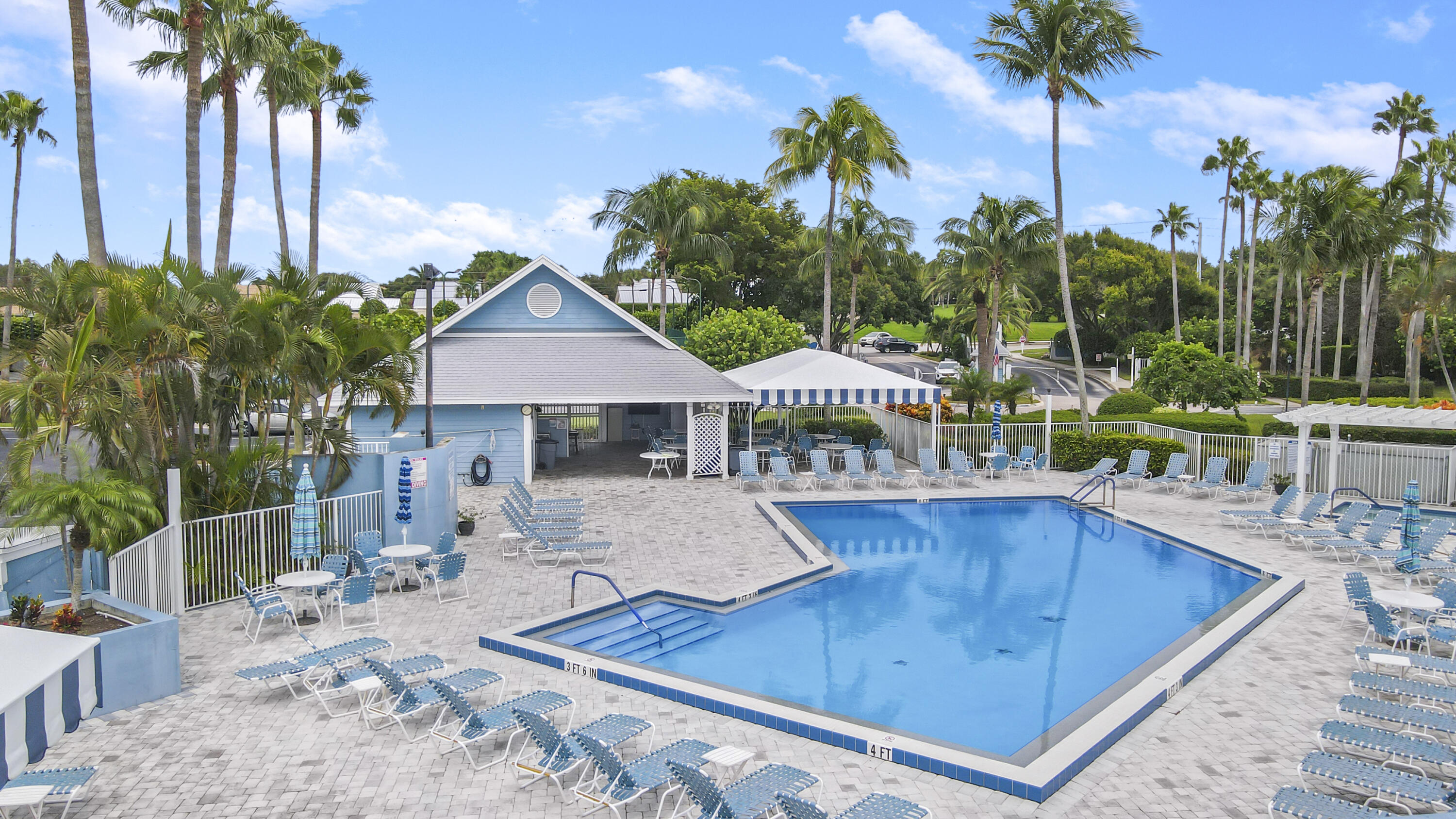 1219 Ocean Dunes Circle Jupiter, FL 33477 - Photo 32 of 32 Pool and Covered Club Area