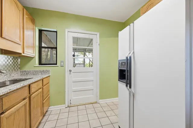a view of walk in closet with window