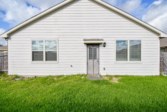 a view of a backyard with a garden