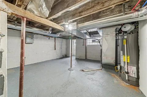 a view of under construction room and a window