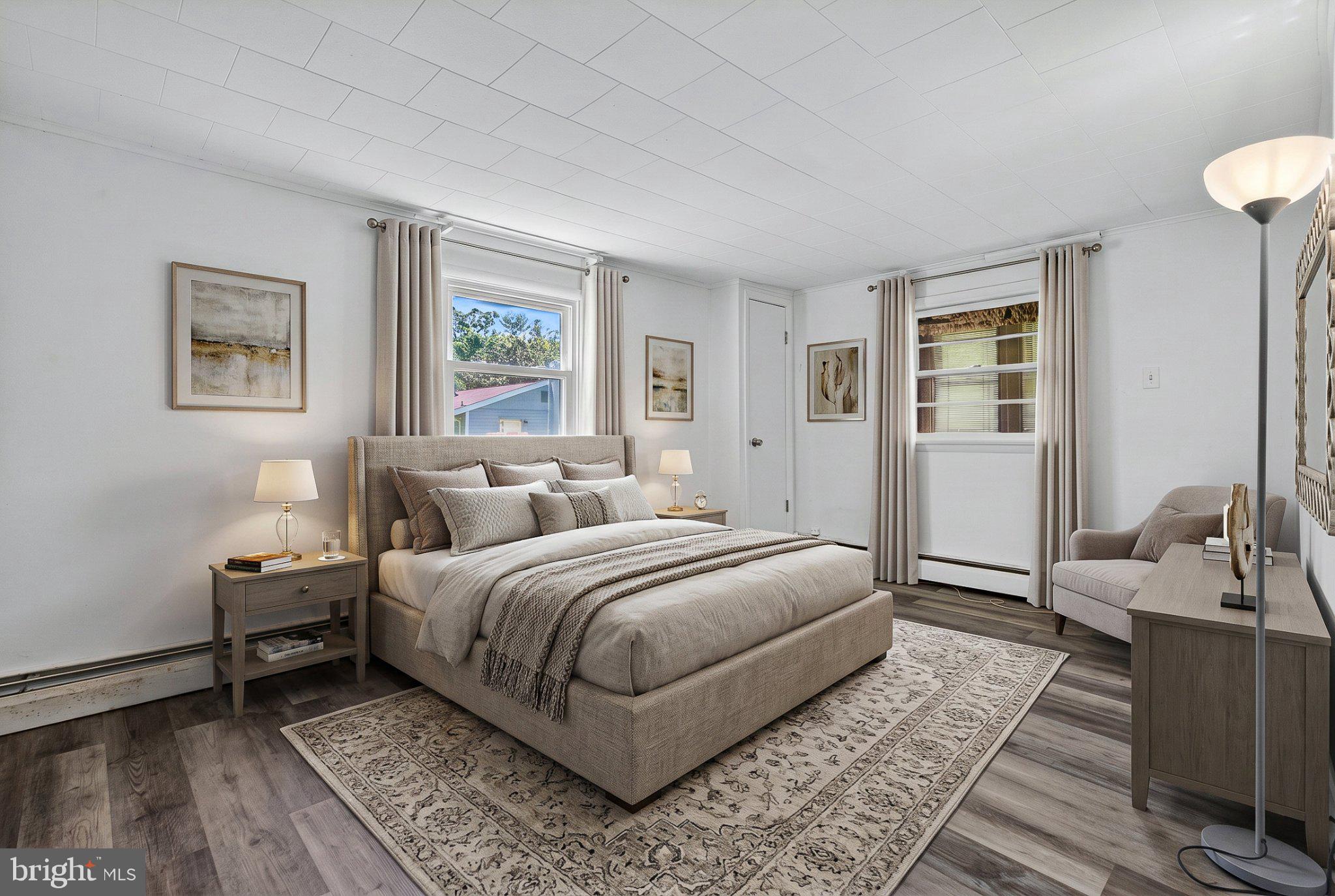 607 Dembytown Road, Unit B Joppa, MD 21085 - Photo 16 of 55 Serene bedroom with natural light.