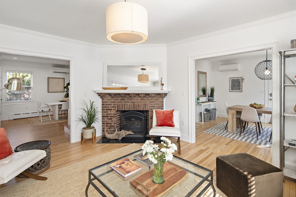 106 Florence Avenue Arlington, MA 02476 - Photo 14 of 32 a living room with furniture and a fireplace