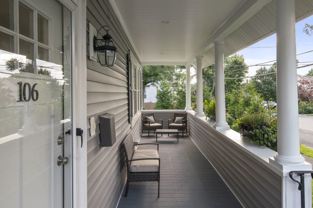 106 Florence Avenue Arlington, MA 02476 - Photo 2 of 32 a view of a balcony with chairs and wooden floor