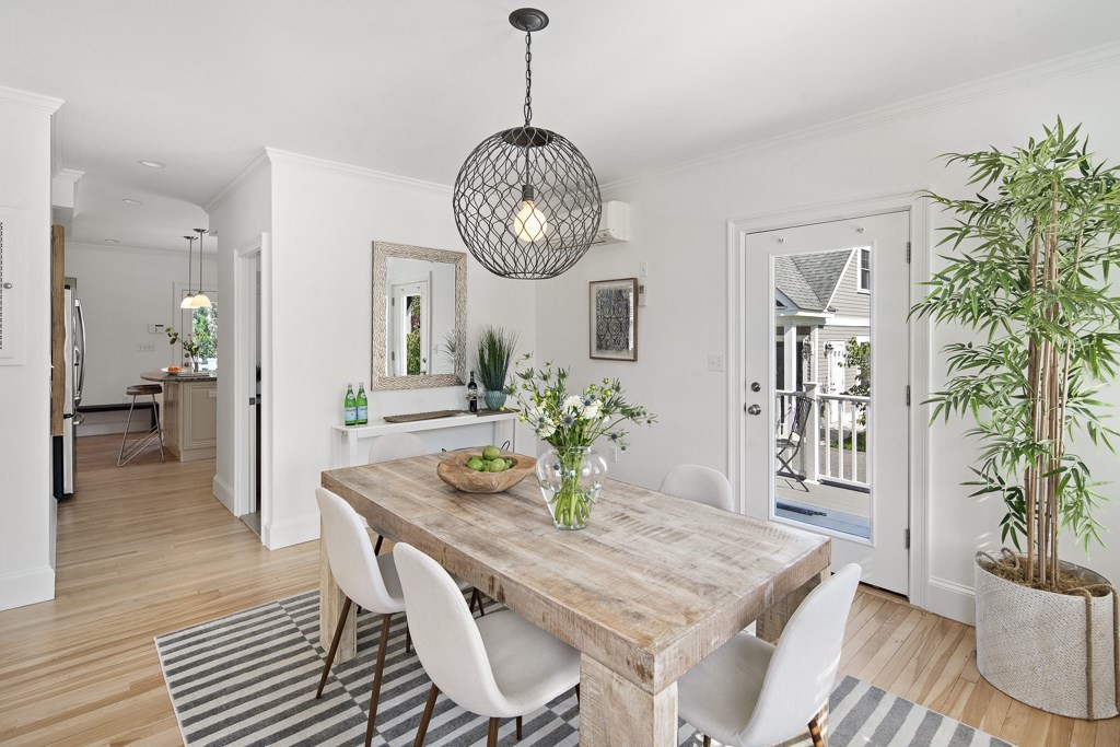 106 Florence Avenue Arlington, MA 02476 - Photo 9 of 32 a view of a dining room with furniture and wooden floor