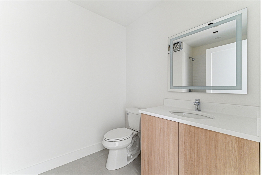 1035 Commonwealth Avenue, Unit 608 Boston, MA 02215 - Photo 6 of 13 a bathroom with a sink and a toilet