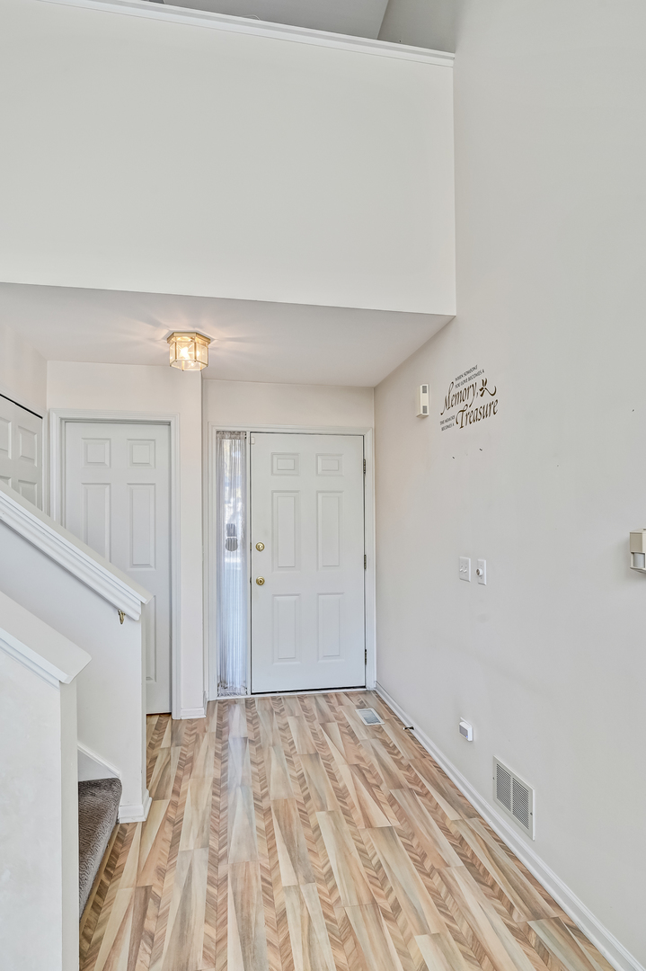 945 Willow Street Itasca, IL 60143 - Photo 5 of 19 a view of a room with wooden floor