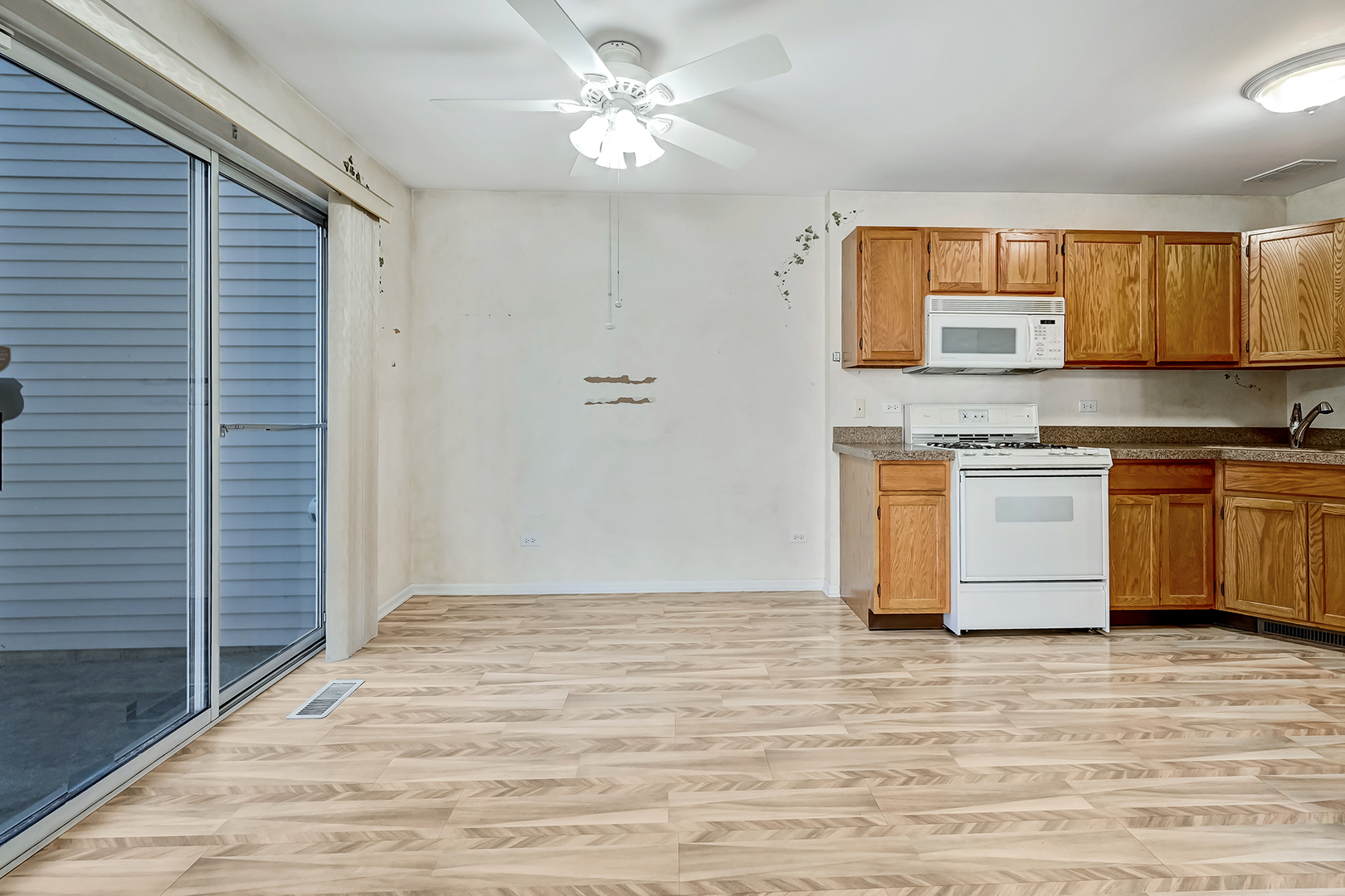 945 Willow Street Itasca, IL 60143 - Photo 9 of 19 a view of kitchen with stainless steel appliances granite countertop a stove a sink and a refrigerator