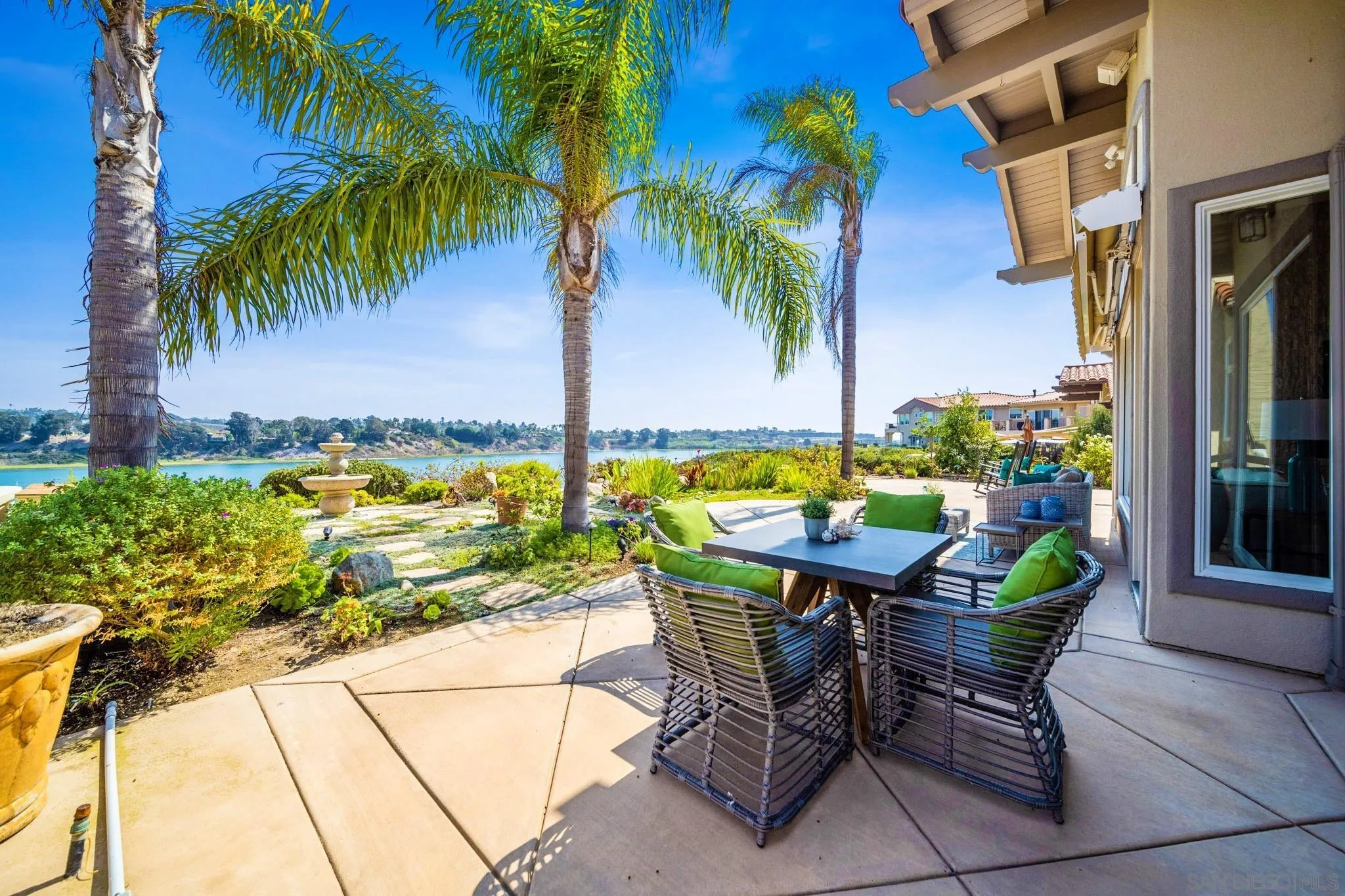7558 Navigator Circle Carlsbad, CA 92011 - Photo 17 of 38 a view of an outdoor sitting area with swimming pool