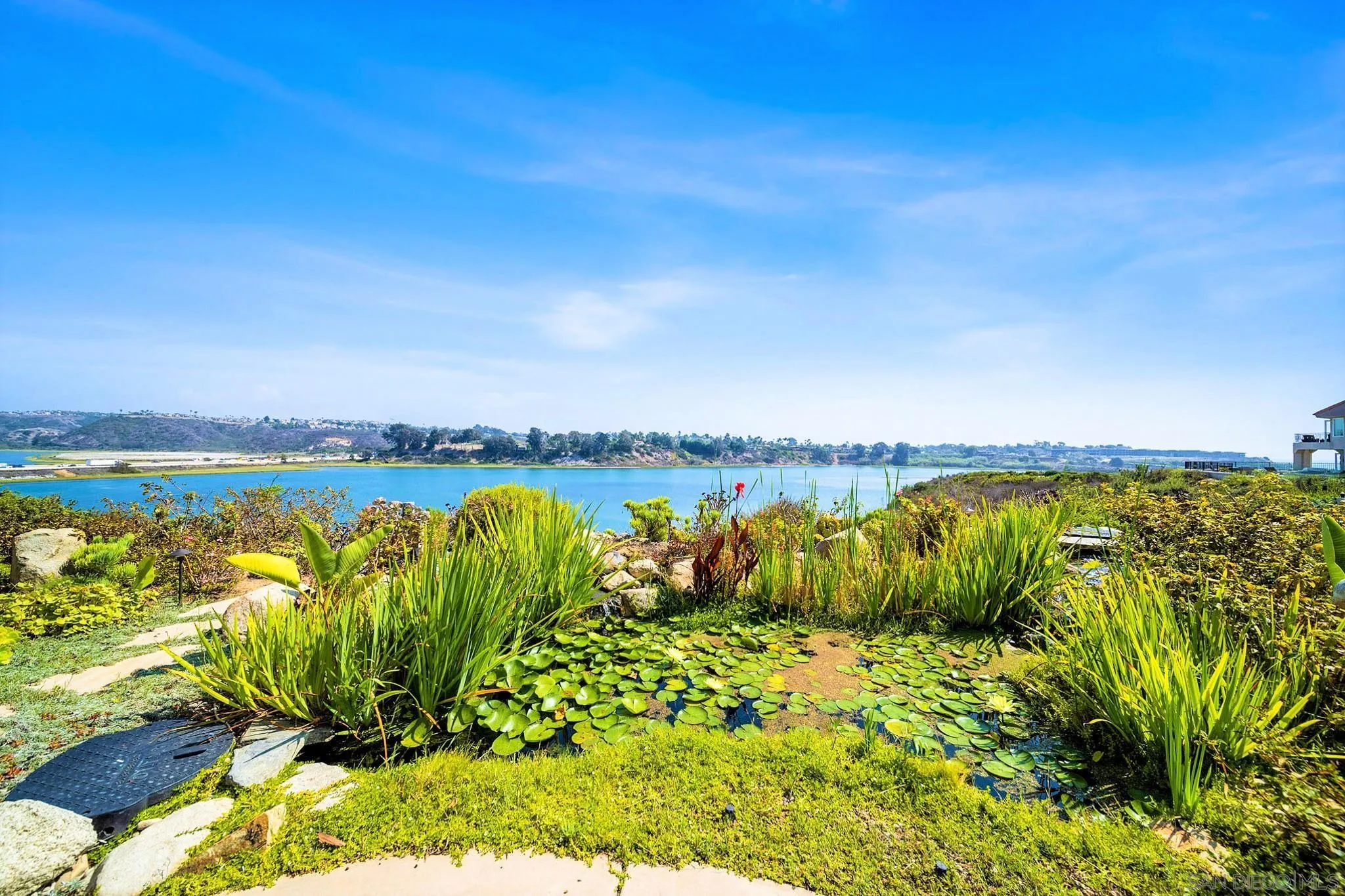 7558 Navigator Circle Carlsbad, CA 92011 - Photo 19 of 38 a view of a ocean with a beach