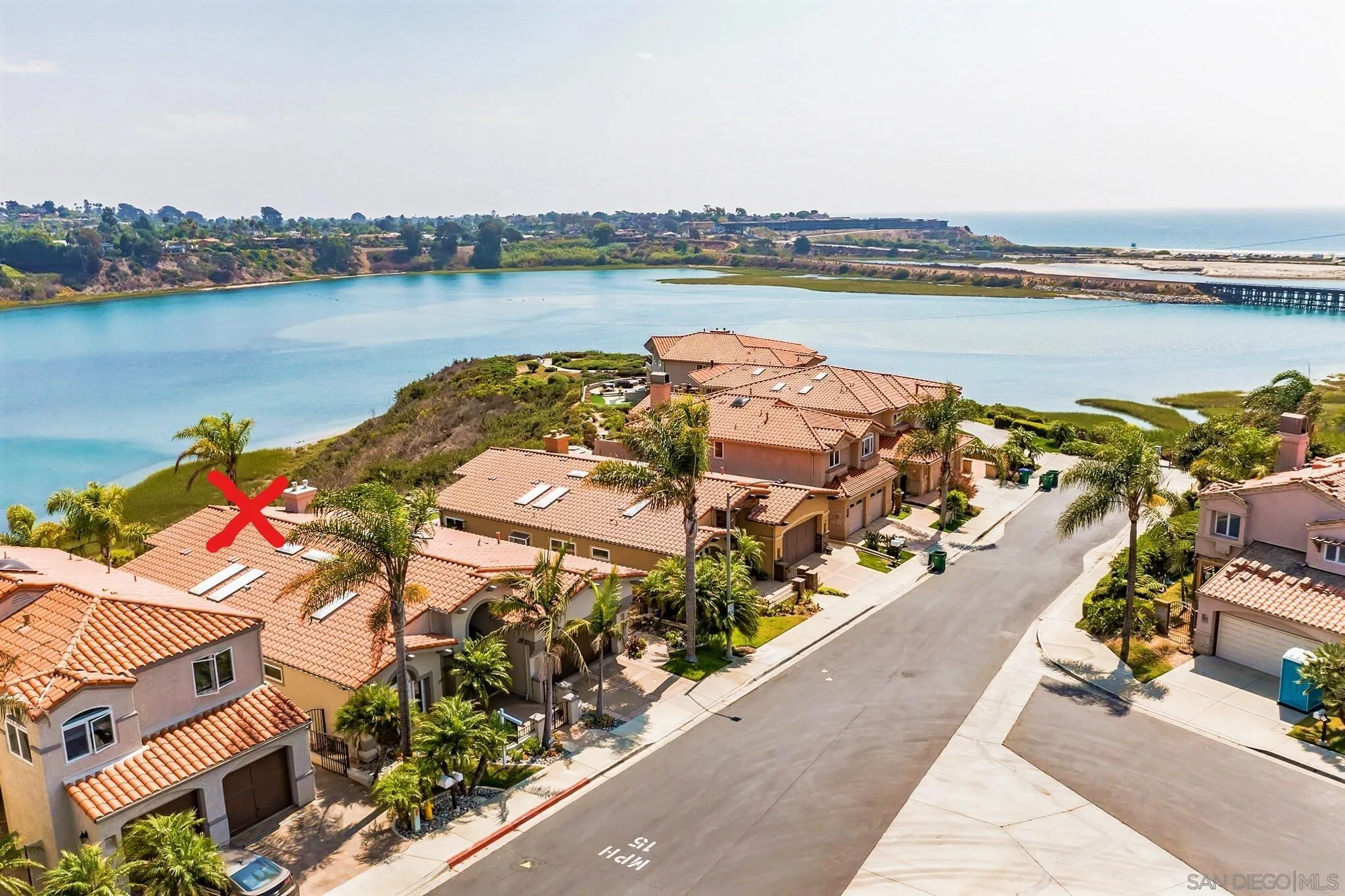 7558 Navigator Circle Carlsbad, CA 92011 - Photo 21 of 38 an aerial view of a house with a lake view