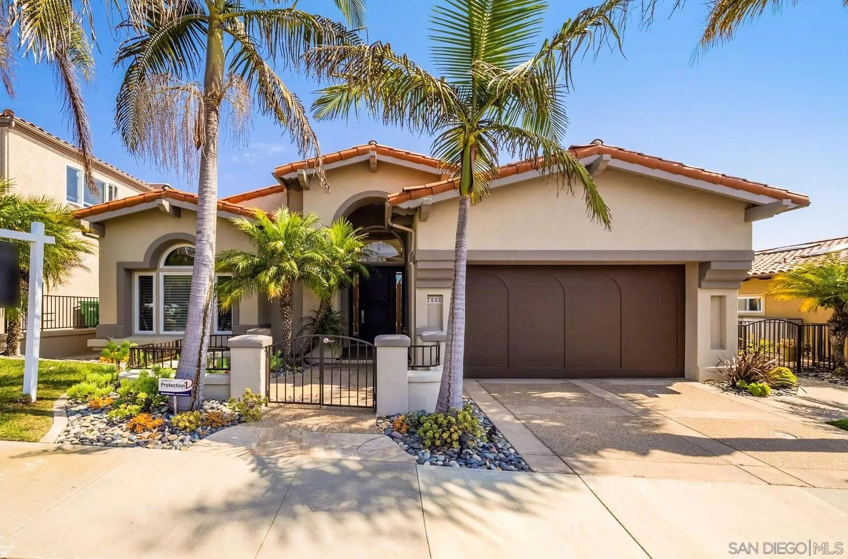 7558 Navigator Circle Carlsbad, CA 92011 - Photo 3 of 38 a view of a house with a patio