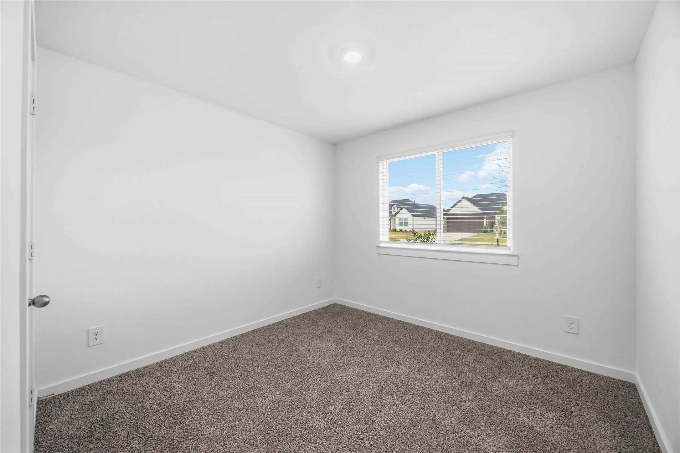 31627 Featherstone Trail Fulshear, TX 77441 - Photo 16 of 29 an empty room with windows