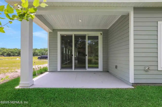 a view of a porch with a yard