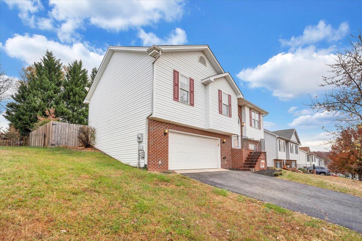 1748 Meadows Road Vinton, VA 24179 - Photo 3 of 34 a view of a house with a yard