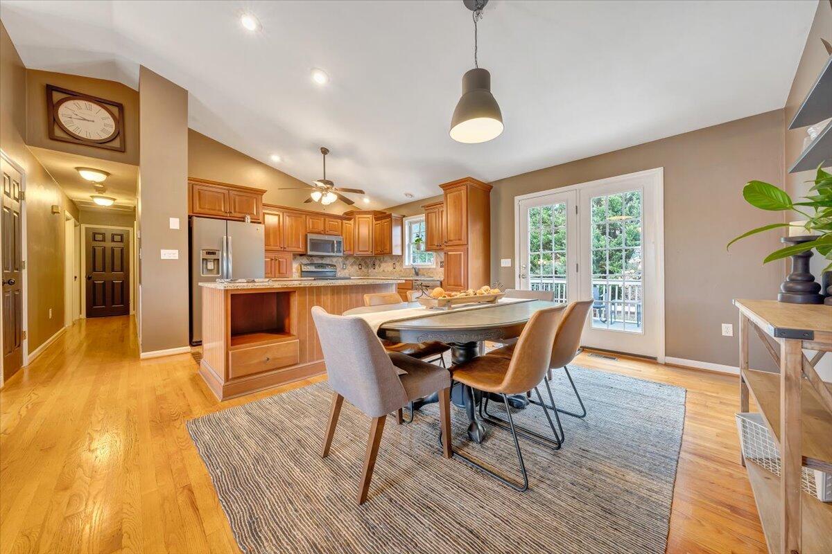 1748 Meadows Road Vinton, VA 24179 - Photo 10 of 34 a dining room with furniture and wooden floor