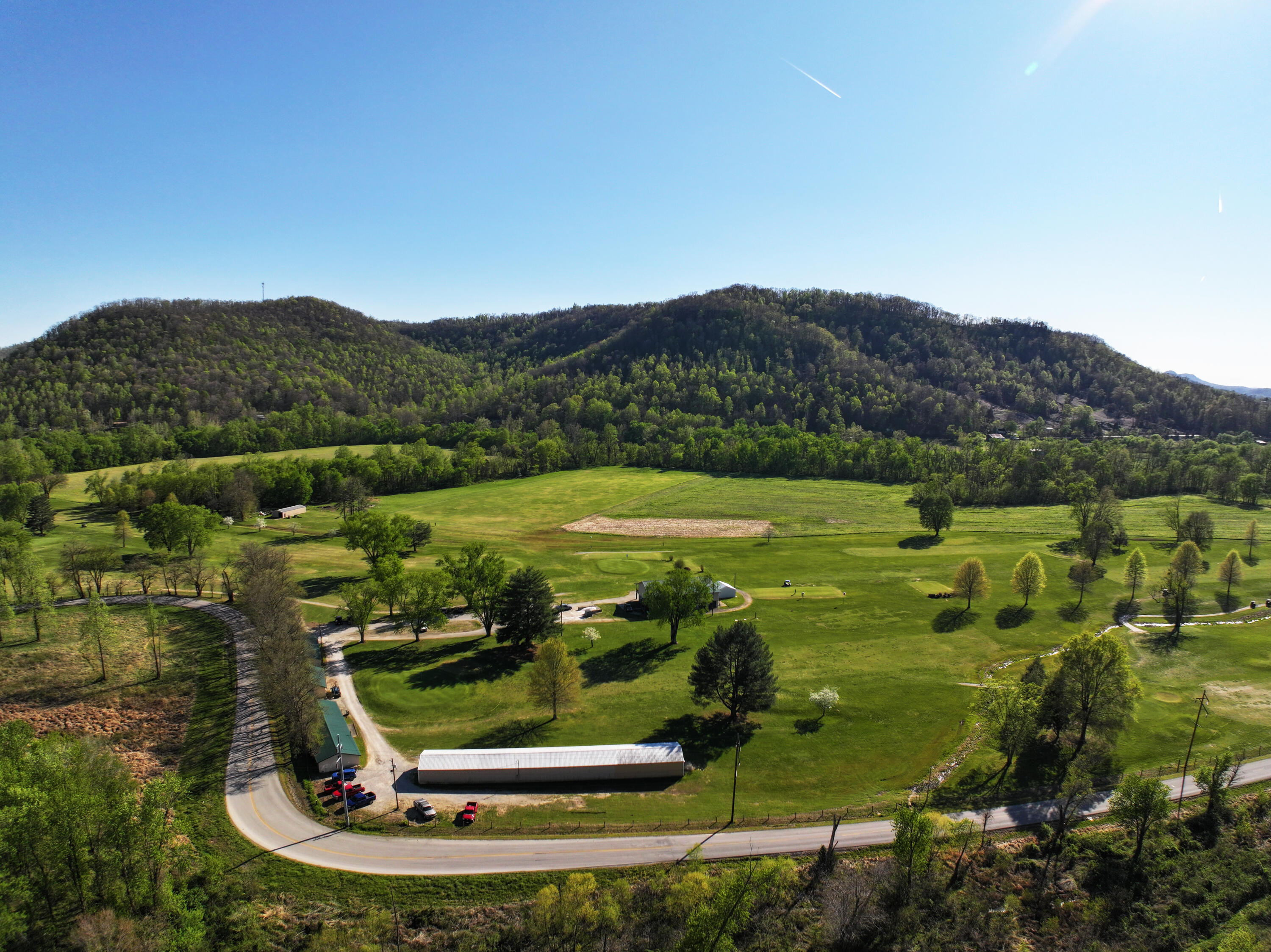 413 Elm Street Ravenna, KY 40472 - Photo 39 of 42 Golfer? Picturesque golf course in Ravenna.