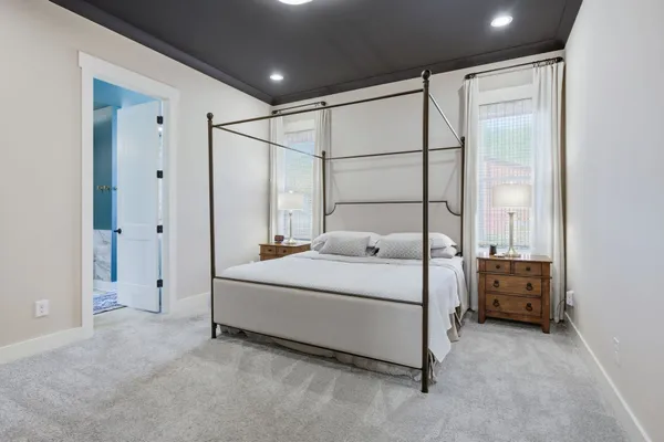 a spacious bathroom with a double vanity sink and a mirror