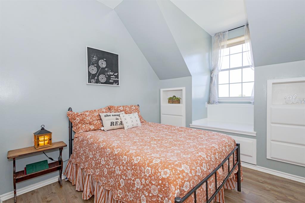 13508 Deussen Road Ponder, TX 76259 - Photo 23 of 40 a bedroom with a bed and a window