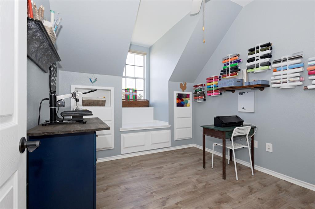 13508 Deussen Road Ponder, TX 76259 - Photo 27 of 40 a room with furniture a clock and a window