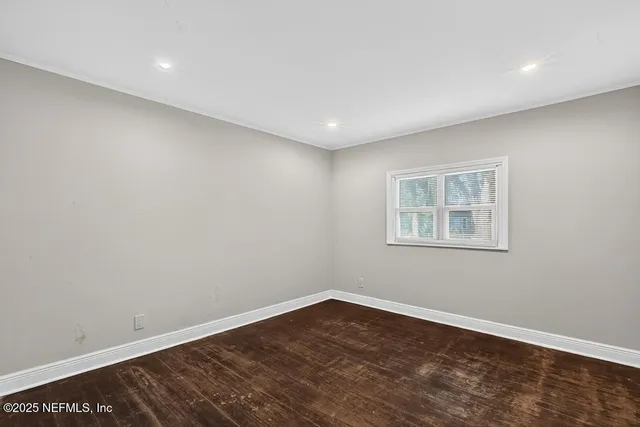 a backyard of a house with lots of green space