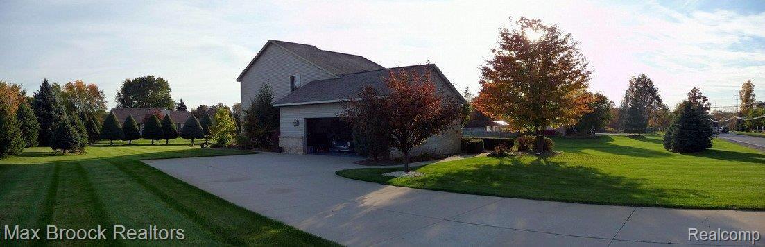 4065 East Commerce Road Commerce Township, MI 48382 - Photo 2 of 25 2 Car Side Entry Garage