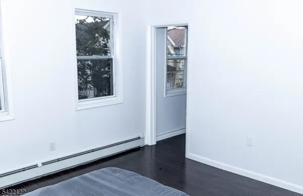 a view of room with racks on the wall