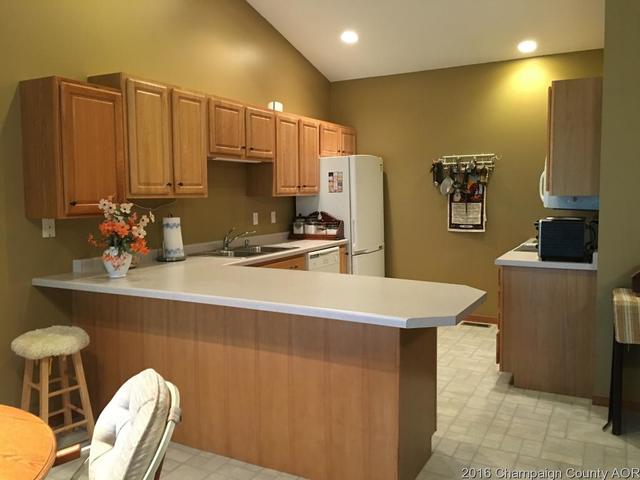 804 Kara Street St. Joseph, IL 61873 - Photo 2 of 24 a room with table chairs and a refrigerator