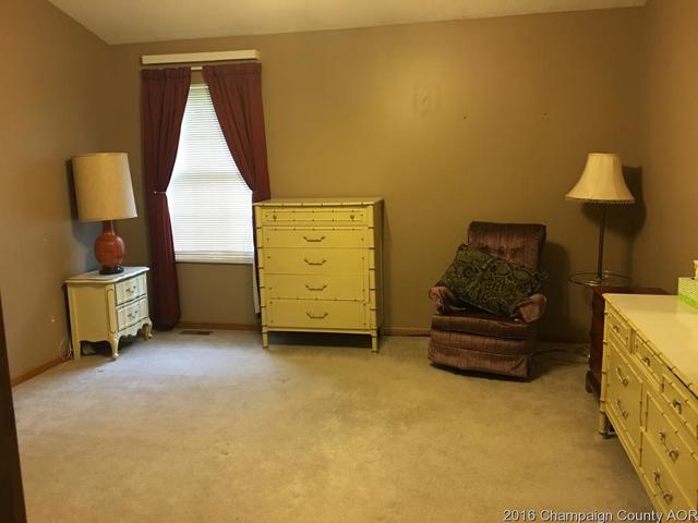804 Kara Street St. Joseph, IL 61873 - Photo 13 of 24 a living room with furniture and a window