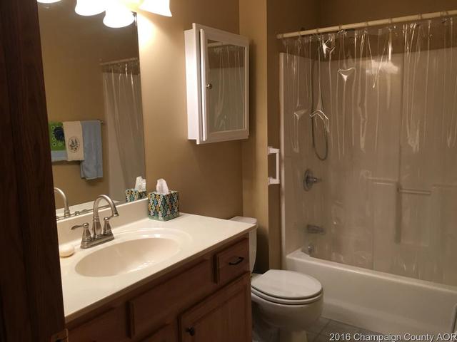 804 Kara Street St. Joseph, IL 61873 - Photo 14 of 24 a bathroom with a sink toilet and shower