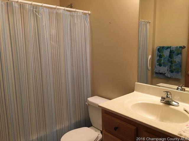 804 Kara Street St. Joseph, IL 61873 - Photo 17 of 24 a bathroom with a sink and a mirror